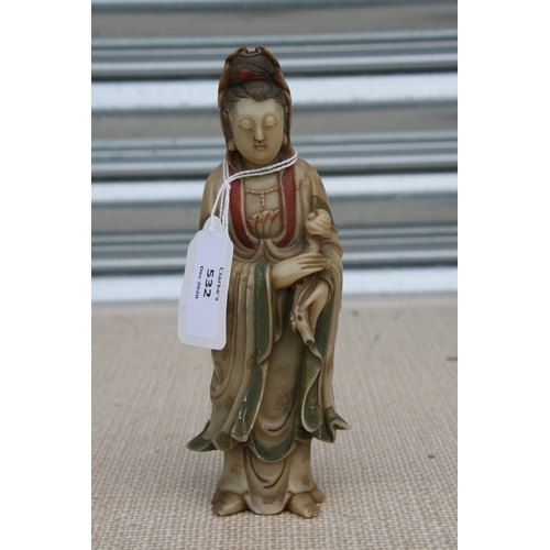 532 - An 18th / 19th century Chinese polychrome soapstone carving depicting Guanyin, 17cms (6.75ins) high.