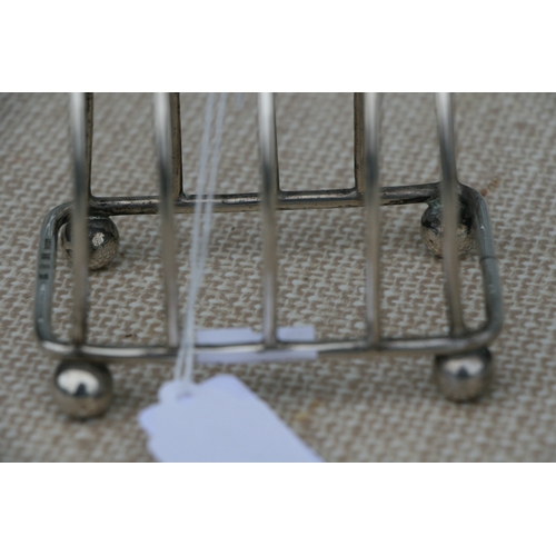 955 - A Victorian four-division silver toast rack, Birmingham 1891, weight 87g.