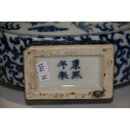 449 - A Chinese blue & white moon flask decorated dragons chasing a flaming pearl and foliate scrolls, fou... 