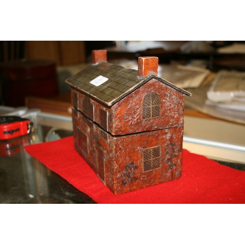 577 - A folk art style perfume caddy in the form of a cottage, interior fitted with a pair of flashed cut ... 