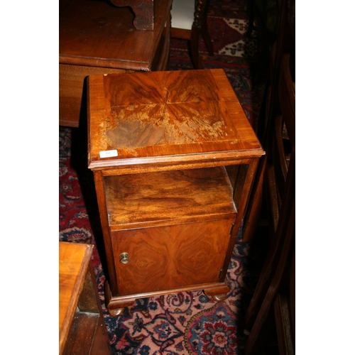 756 - A pair of figured walnut bedside cabinets, 40cms (16ins) wide.