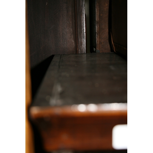 770 - An 18th century walnut chest on stand with an arrangement of five drawers above a stand with three d... 