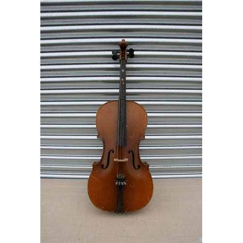 891 - A cello with one-piece back, in a soft carry case, 122cms (48ins) high; together with another simila... 