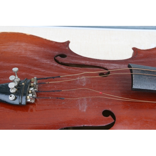 891 - A cello with one-piece back, in a soft carry case, 122cms (48ins) high; together with another simila... 