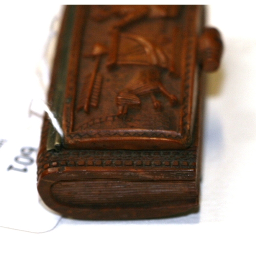 601 - A 19th century coquilla nut snuff box, finely carved with Cupid, 7.5cms (3ins) wide.