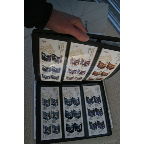 61 - A collection of commemorative First Class stamps for the 2012 London Olympics, in a presentation alb... 