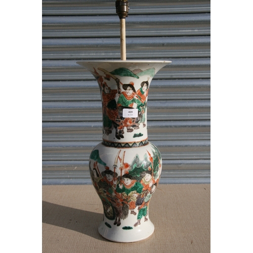 409 - An 18th century famille vert vase of flared form decorated with warriors, converted to a lamp, 44cm ... 