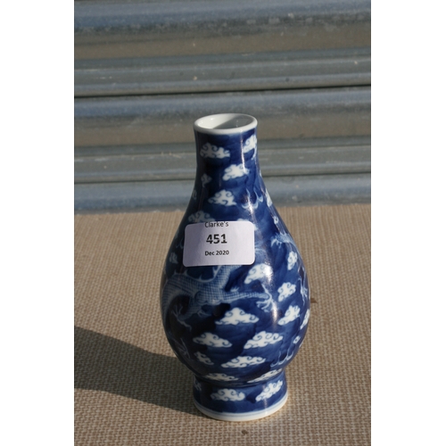 451 - A Chinese blue & white vase decorated dragons amongst clouds chasing a flaming pearl, blue six c... 