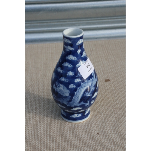 451 - A Chinese blue & white vase decorated dragons amongst clouds chasing a flaming pearl, blue six c... 