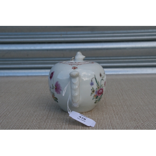 478 - An 18th century Chinese famille rose teapot decorated flowers with peach finial.9cm (3.5 ins)