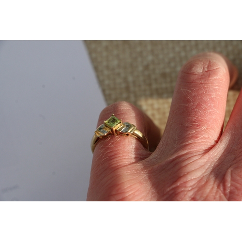 1026 - A 9ct gold peridot and diamond ring. Approx UK size N. 1.8g