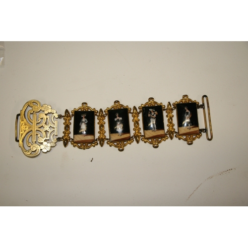 231 - A continental gilt metal and porcelain panel belt with eight rectangular panels decorated with figur... 