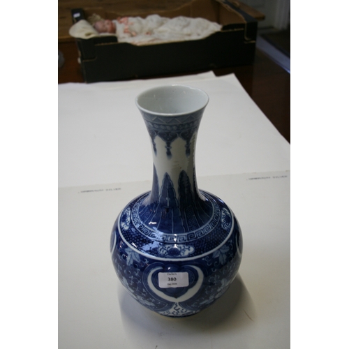 380 - A large Chinese blue & white vase decorated with flowers and dragons, four character blue mark to th... 