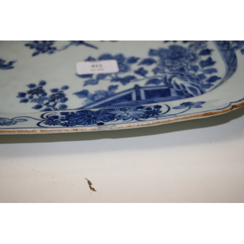 411 - A pair of 18th century Chinese blue and white dishes of elongated octagonal form, decorated birds am... 