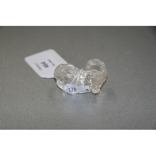 464 - A Chinese rock crystal figure of a shi shi, 4.5cms (1.75ins) wide.