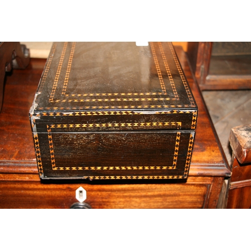 573 - A 19th century Anglo-Indian ebony workbox with fitted interior, 37cms (14.5ins) wide.