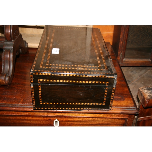 573 - A 19th century Anglo-Indian ebony workbox with fitted interior, 37cms (14.5ins) wide.