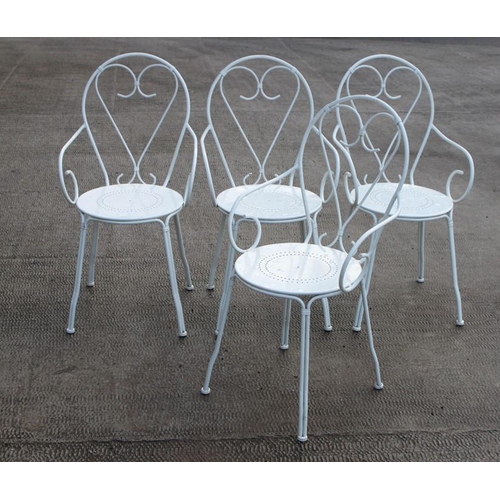 10 - A set of four painted wire work scroll garden chairs (4).