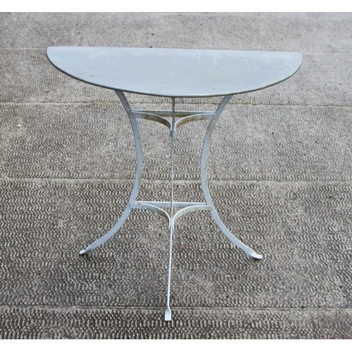 12 - A painted metal garden table with zinc demi-lune top, 79cms (31ins) wide.