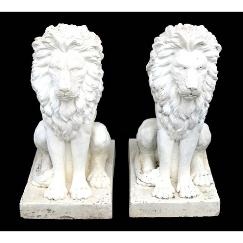 14 - A large pair of weathered fibreglass rampant lions, each approx. 89cms (35ins) high (2).