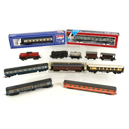 143 - A quantity of 'OO' gauge locomotives, rolling stock and coaches to include Lima, Jouef, Hornby and T... 