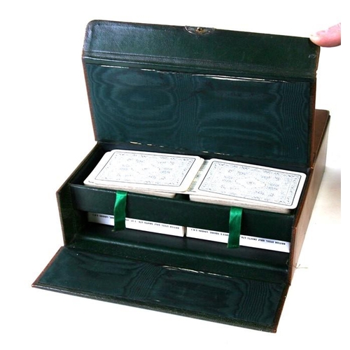 145 - A game of bridge cards compendium in a leather case.