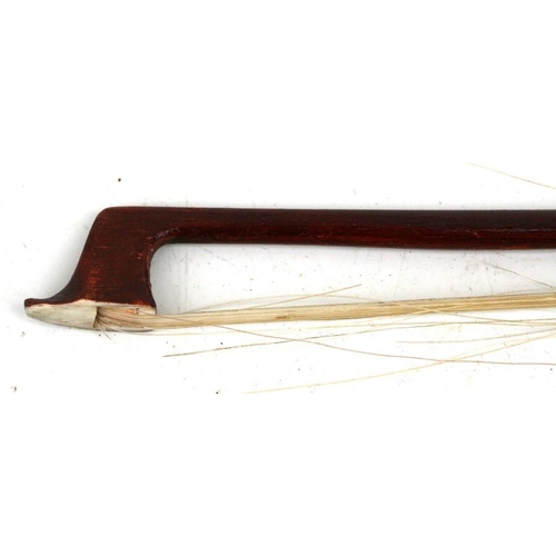 158 - A one piece back violin and bow in a coffin shaped case, 56cms (22ins) long.