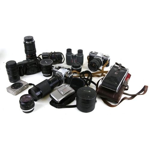 166 - A pair of Carl Zeiss Jena GDR 10x50W binoculars, cased; together with a similar pair; a Pentax camer... 