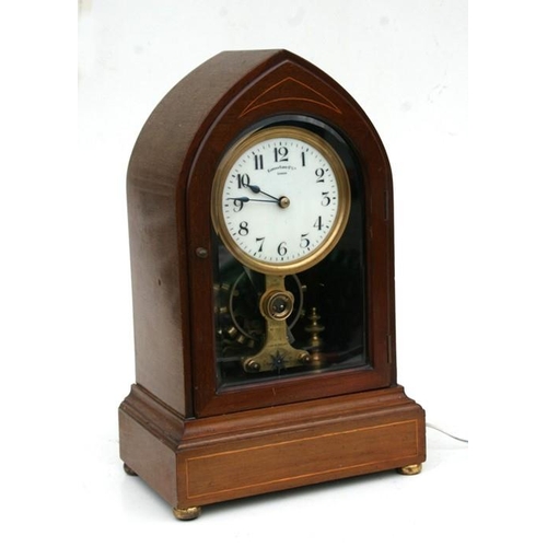 182 - An early 20th century Eureka Electric Co. Ltd., London mantle clock designed by Timothy Powers, a ma... 