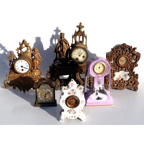 196 - A quantity of French late 19th century and later mantle clocks, all for restoration or spares.