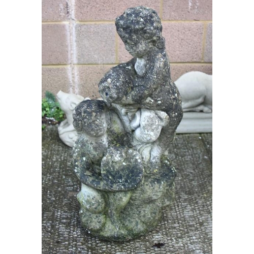 20 - A well weathered reconstituted stone garden fountain, 75cms (29.5ins) high.