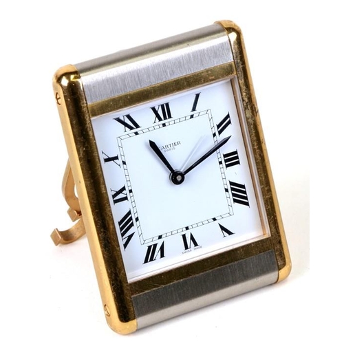 201 - A Cartier brushed steel and brass travel alarm clock, 7.5cms (3ins) wide.Condition Reportsome light ... 