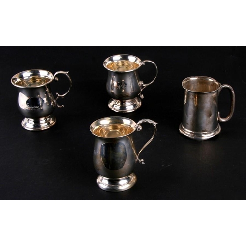 220 - A group of four small silver tankards, the largest 9cms (3.5ins) high, weight 414g (4).