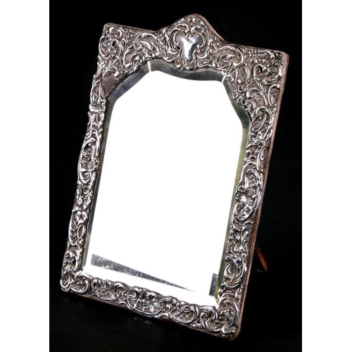 225 - A silver framed strut mirror, indistinct Birmingham hallmark lower left, 19 by 27cms (7.5 by 10.5ins... 