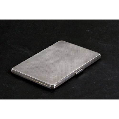 232 - A silver cigarette case with engine turned decoration, Herbert Bushell & Son Ltd, Birmingham 1934, w... 