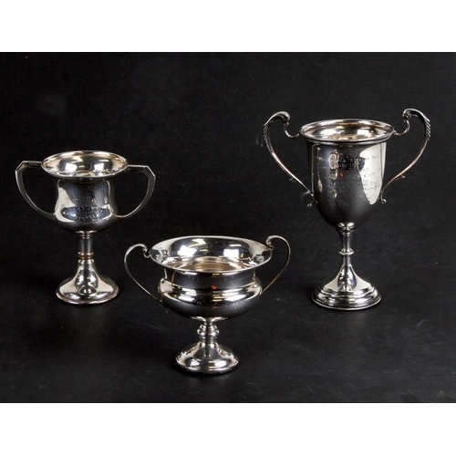 237 - Three silver two-handled presentation cups, all with presentation inscriptions, London 1933, weight ... 