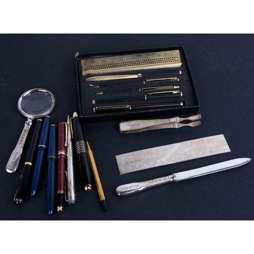 239 - A Royal Mail silver desk top set to include ruler, magnifier, letter opener, tweezers and pen; toget... 