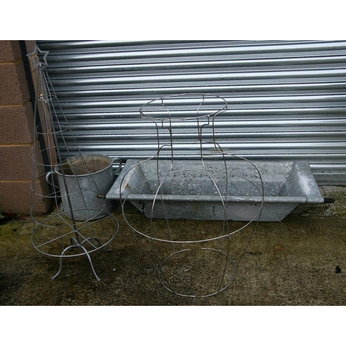 24 - A galvanised metal trough, 110cms (43ins) wide; together with a similar hopper, 34cms (13.5ins) diam... 