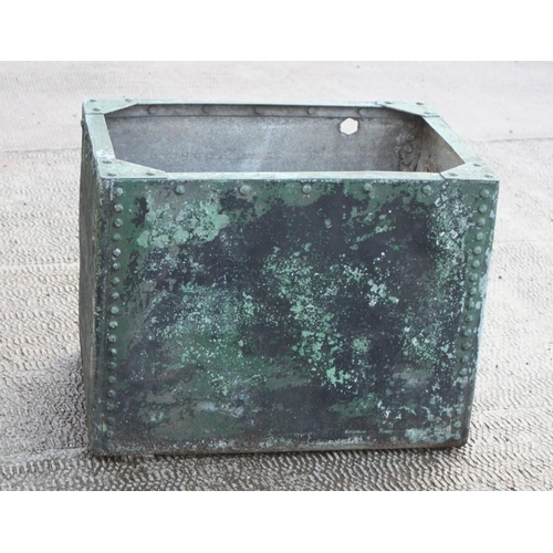 3 - A rectangular galvanised water tank or planter, 67cms (26ins) wide.