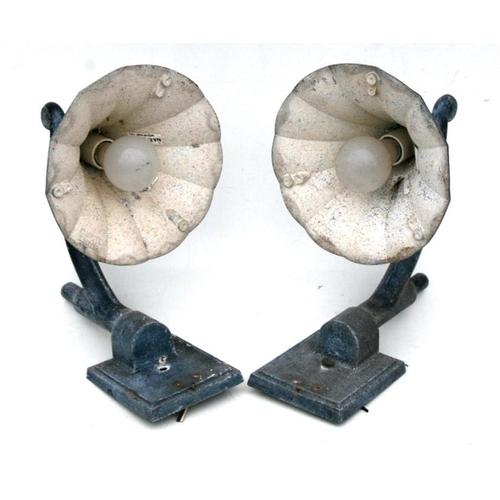 37 - A pair of patinated metal outside wall lights, 38cms (15ins) high.