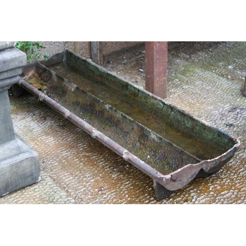 4 - A cast iron pig trough / planter, 92cms (36ins) wide.