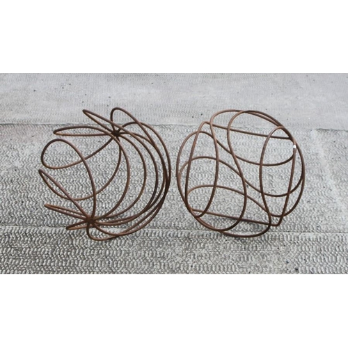 40 - A pair of steel openwork garden spheres, 43cms (17ins) diameter.