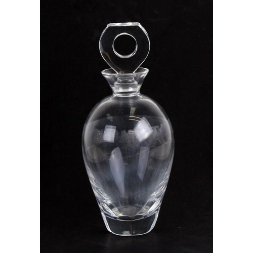 47 - A Lalique glass decanter with stylised stopper having an open ring centre, etched signature to the u... 