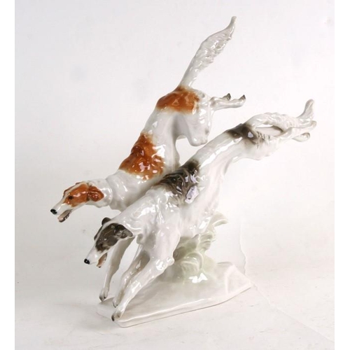 50 - A Hutschenreuther (Germany) porcelain group in the form of running Borzois, modelled by K Tutter, 30... 