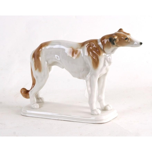 51 - A Karl Ens porcelain figure of a standing Borzoi, 16cms (6.25ins) high.