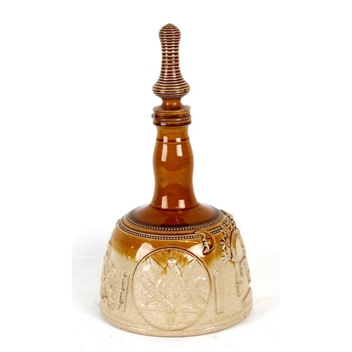 88 - A salt glazed stoneware mallet shaped decanter decorated in relief with Masonic symbols, 37cms (14.5... 