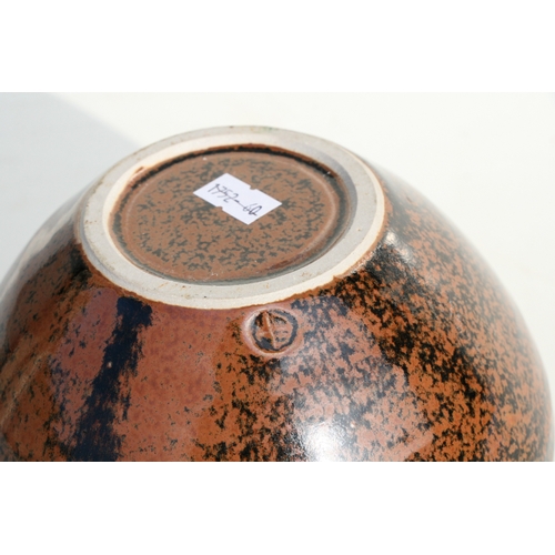 65 - A British Studio Pottery vase with four lug handles in Tenmoku glaze, impressed potters mark within ... 