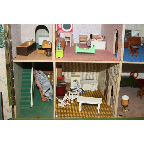 147 - A 1930's Tri-Ang mock Tudor two storey dolls house. together with some furniture and accessories 67c... 