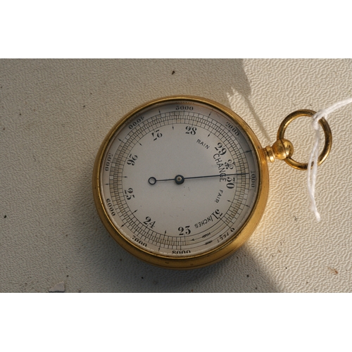 167 - A 19th century pocket barometer in a leather case.