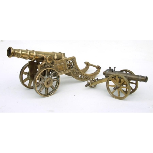100 - A large brass fireside cannon, overall length 44cms (17.25ins) and weighing in excess of 5kgs (11 lb... 